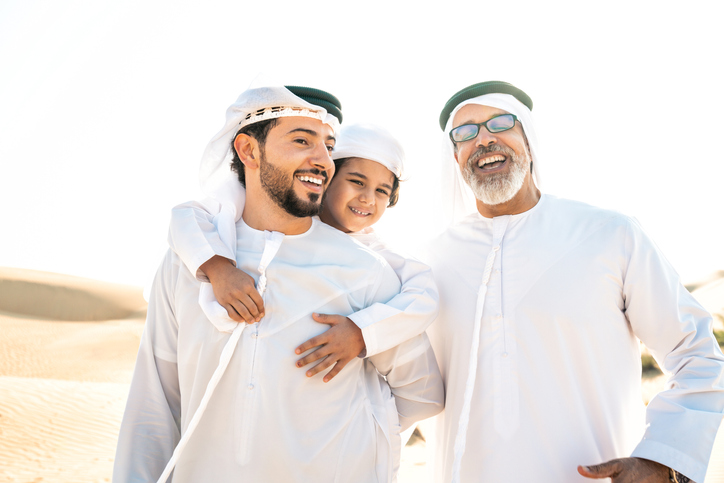 Three generation family making a safari in the desert of Dubai