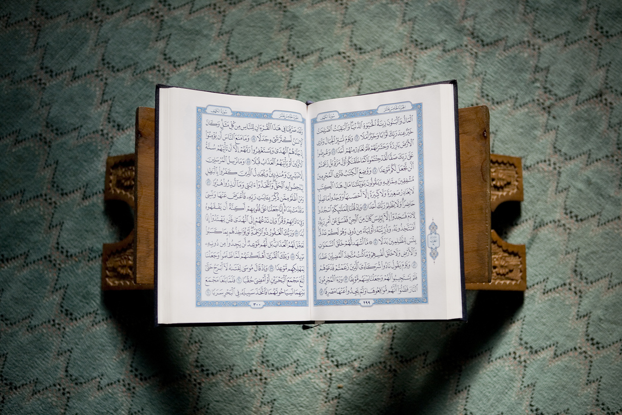 Open Qur'an representing Islamic inheritance principles